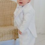 Baby boy in all white tux LDS baby blessing Catholic baptism
