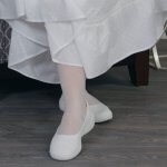 White shoes. Comfortable stretch slip on shoe. Perfect for everyday use or temple wear. Washable