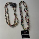 Handmade African paper bead necklaces from Mpendo Beads, supporting the Mpendo Packer Foundation.