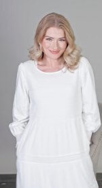 100% cotton shell with a light poly lining. LDS temple dress. Smocked top with a back zipper. 2 deep pockets.