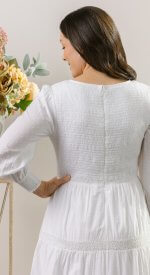 100% cotton shell with a light poly lining. LDS temple dress. Smocked top with a back zipper. 2 deep pockets.