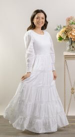 100% cotton shell with a light poly lining. LDS temple dress. Smocked top with a back zipper. 2 deep pockets.