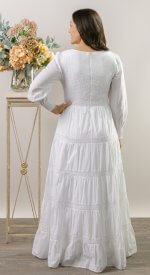 100% cotton shell with a light poly lining. LDS temple dress. Smocked top with a back zipper. 2 deep pockets.