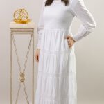 100% cotton shell with a light poly lining. LDS temple dress. Smocked top with a back zipper. 2 deep pockets.