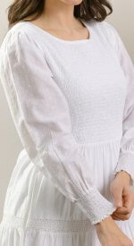 100% cotton shell with a light poly lining. LDS temple dress. Smocked top with a back zipper. 2 deep pockets.